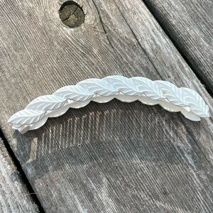 white plastic designed banana hair clip